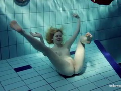 Free-FreePorn.com presents: Blonde goes for a swim and strips