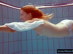 Free-FreePorn.com presents: Redhead in a white dress and sexy bikini