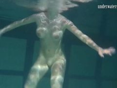 Free-FreePorn.com presents: Naked brunette with big tits swims solo