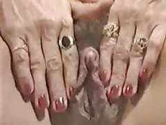 Free-FreePorn.com presents: Milf plays with her big clit