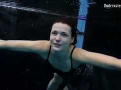 Free-FreePorn.com presents: Beautiful girl swims and smiles underwater