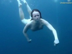 Free-FreePorn.com presents: Three ladies get naked swimming in the ocean