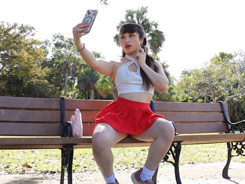 Free-FreePorn.com presents: Gorgeous solo college babe doing striptease in a park - pixie