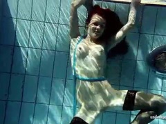 Free-FreePorn.com presents: In black stockings pretty girl goes for a swim