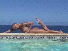 Free-FreePorn.com presents: Blonde strips from bikini and takes a dip