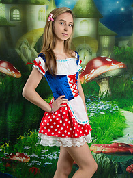 Free-FreePorn.com presents: Very hot blonde teen beauty in an adorable outfit slowly takes it off to reveal her nice and perky boobs