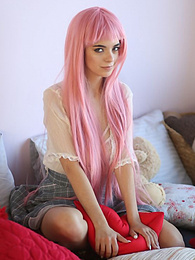 Free-FreePorn.com presents: Teen sweetheart with a long pink hair gets nude and flashes her gorgeous breasts and pussy