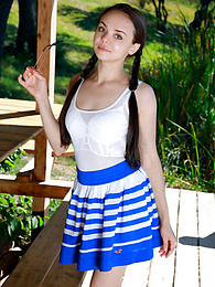 Free-FreePorn.com presents: Fresh-Faced russian beauty Mia Grandy gets totally naked on a picnic table in a garden